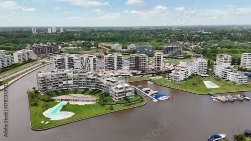 Beautiful Aerial Shot of Luxury Apartment Buildings and Marina, In Nordelta Bay, Buenos Aires, Argentina - Miami style.