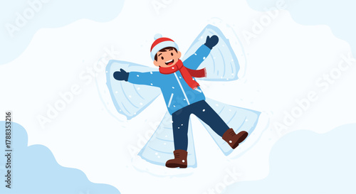 A happy child in a warm winter outfit joyfully creates a classic snow angel in soft, white snow on a clear, cold winter day.