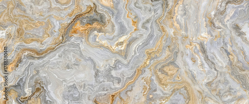 High-resolution marble surface featuring gray and beige tones with wavy organic veins. Perfect for architectural designs, modern interiors, tile surfaces, and decorative background uses.