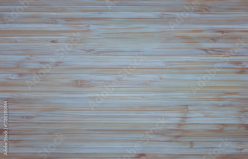 Natural light wood plank surface with visible grain pattern and soft neutral tones. Perfect for backgrounds, interior design visuals, packaging mockups, or digital presentation layouts.