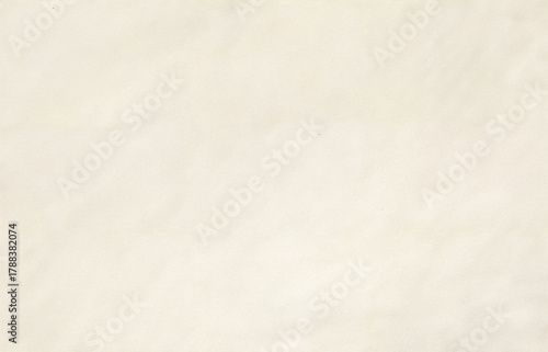 Soft beige handmade paper texture with visible fibers and natural organic surface, suitable for stationery, crafts, backgrounds, packaging, artistic prints, and minimal eco design projects.