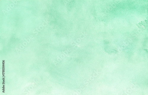 Soft mint green watercolor texture background with subtle brush details. Perfect for design, art projects, digital graphics, print templates, and elegant creative compositions.
