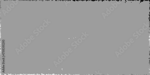 Abstract textured gray background with rough distressed border and subtle white speckles