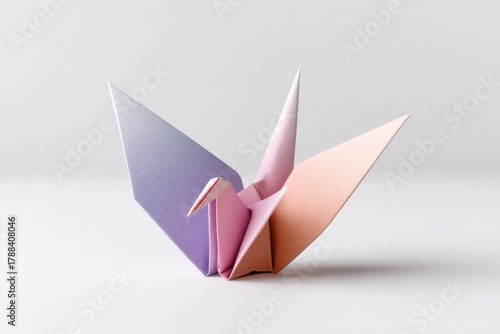 Free Download Delicate origami bird creation on white background for art and craft design - GFXLoad