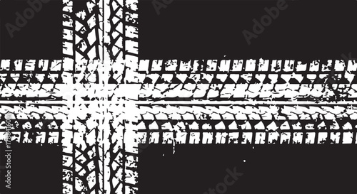Monochrome vector graphic of intersecting dirty tire tread marks, creating a grunge cross pattern on a black textured background