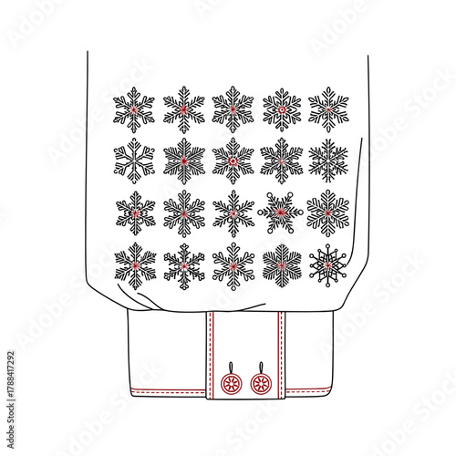 Close up of a snowflake pattern on a dark woolen mitten  