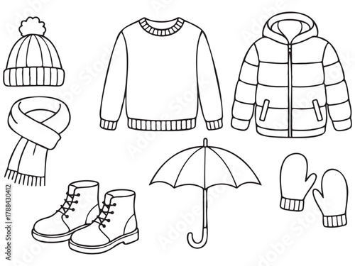 The image is a collection of winter clothing items, including a hat, scarf, gloves, and an umbrella. Scene is cozy and warm