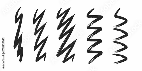 Collection of black hand drawn sketchy zigzag and curved brush stroke lines on a white background