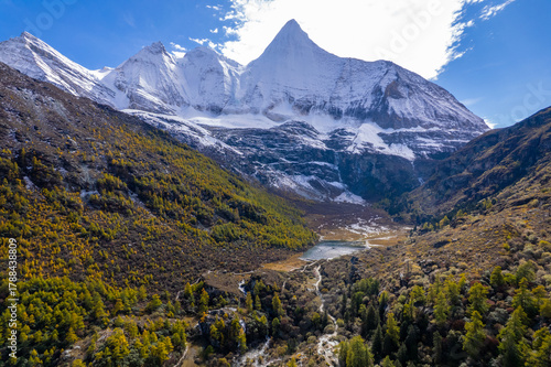 Majestic Yading Nature Reserve in Daocheng, Sichuan, China. Famous for sacred snow-capped peaks, alpine lakes, and pristine highland scenery.