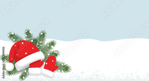 Festive red Santa hats and mittens surrounded by pine branches on a snowy background with copy space