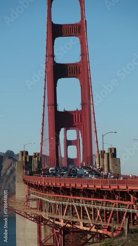 Golden Gate Bridge crossing the Bay area from San Francisco to Sausalito, with traffic and cars.