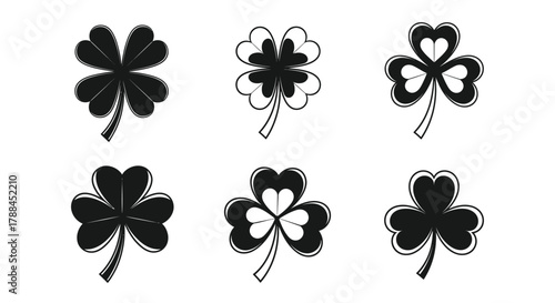 Collection of stylized shamrock and four-leaf clover icons, symbolizing luck and Irish heritage
