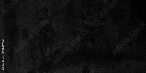 Dark grunge texture with deep black and charcoal tones, featuring rough, cracked surfaces and subtle scratches. cement concrete wall and ceramic tiles background. gray dirty stan, rusty metal texture.