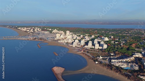 Aerial panorama of the seaside resort of La Grande Motte, in the department of Hérault, in the Occitanie region, France.