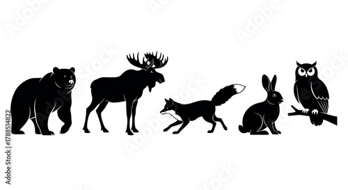 Silhouette of forest animals including a bear, moose, fox, rabbit, and owl in a side-by-side arrangement.