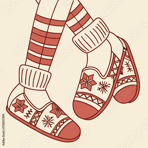 Cozy feet wearing striped socks and snowflake slippers