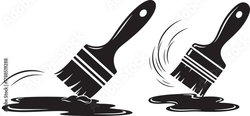 Two paint brushes dipped in black paint silhouette