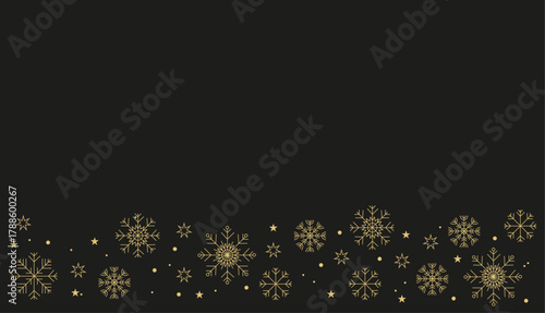 Winter banner with golden snowflakes on a black background