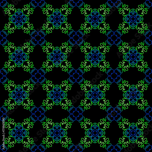An openwork lace pattern in green and blue on a black background. Seamless texture for fabric or wallpaper.