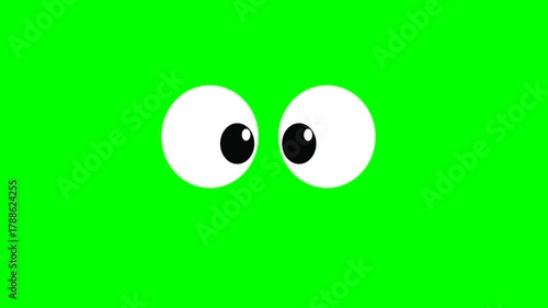 Animation or computer graphics of a winking eye on a green chromakey background for insertion