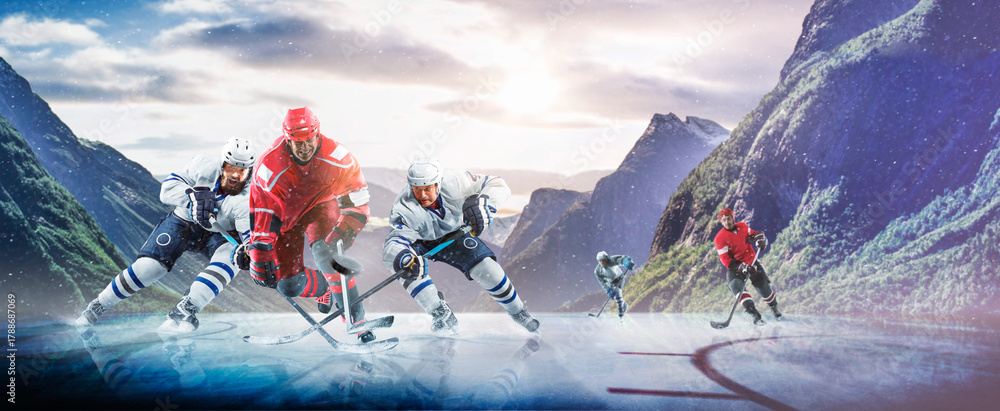Fototapeta premium Hockey players in action on the ice. Outdoor game. Sports. Hockey match. A large hockey rink in the middle of an forest. Hockey concept. Panorama