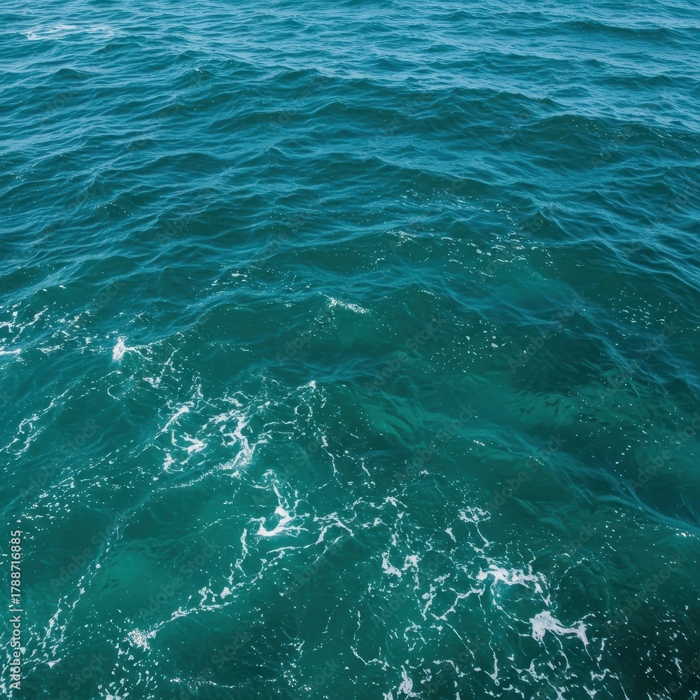 Obraz premium Majestic, powerful ocean surface texture featuring swirling deep aqua and turquoise colors in motion, capturing the refreshing feel of the sea ,serene ,motion ,wave