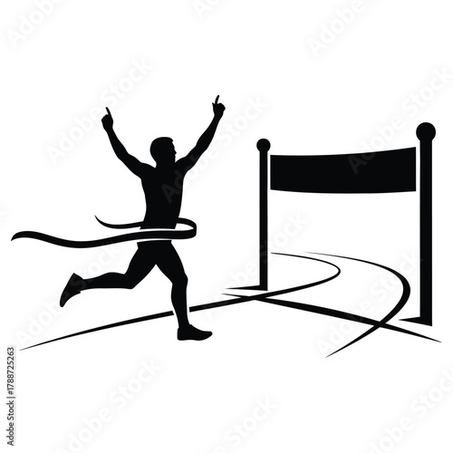 Silhouette of a runner breaking through the finish line tape with arms raised in victory