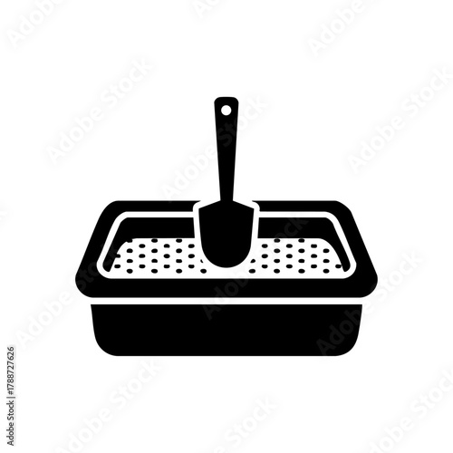 Litter box with scoop showing cleanliness and pet hygiene, ideal for pet care or cleaning concepts.