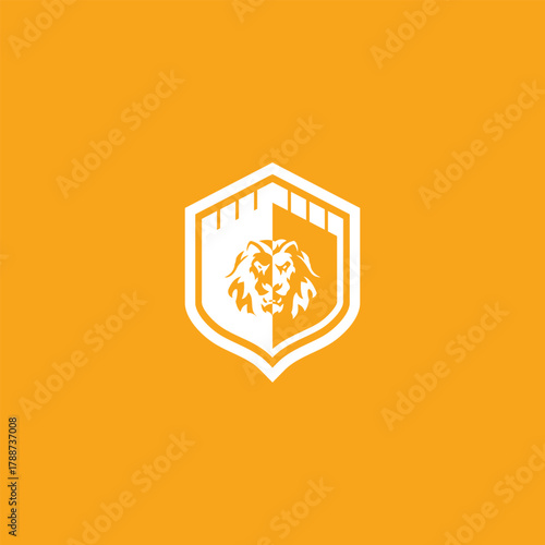 Lion head emblem within a shield, symbolizing strength and security concept