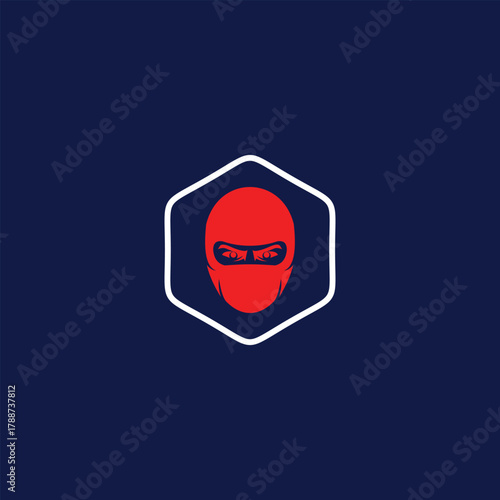 Red masked figure hexagon icon on dark blue background emblem design