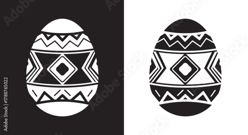 Monochrome Easter egg with intricate geometric tribal pattern design.