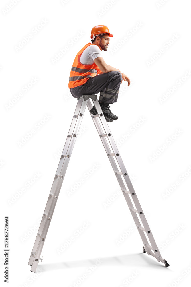 © Ljupco Smokovski - Repairman with a drilling machine on a ladder