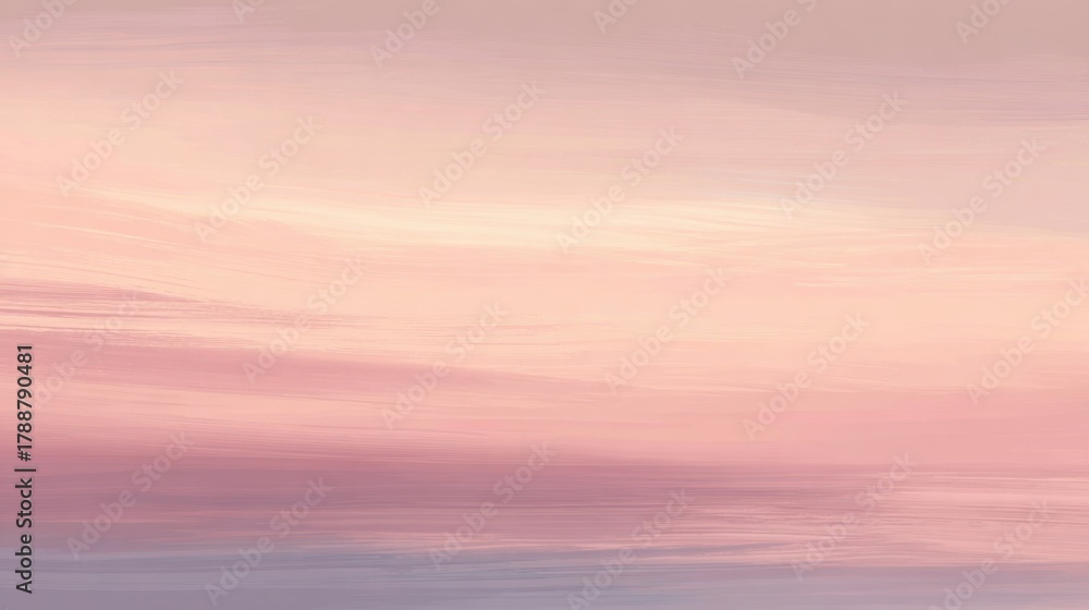 Obraz premium A gentle blend of pink and lavender fills the sky as day transitions to night evoking peace.