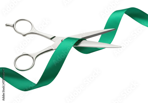 Shiny silver scissors cutting a green ribbon isolated PNG, grand opening celebration and business success concept on transparent background