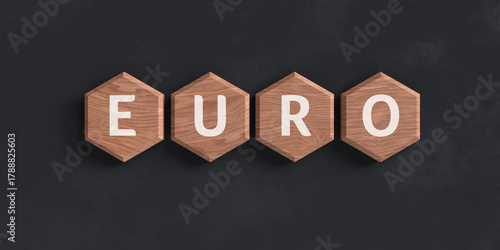 Fototapeta Naklejka Na Ścianę i Meble -  EURO currency name on wooden hexagonal tiles representing finance and economy