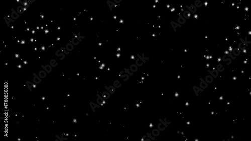 Realistic snow fall seamless loop animation. Falling snowflakes isolated on black background. Transparent effect available with Screen transparency mode. Stock video animation	