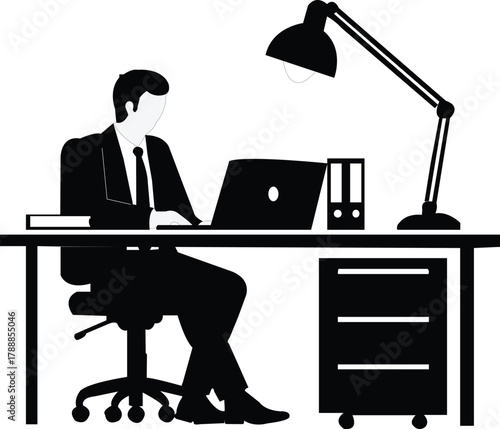 Businessman at desk with laptop, lamp, and filing cabinet office