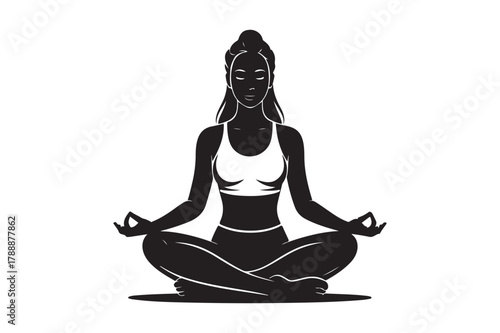 Woman in lotus pose silhouette practicing meditation