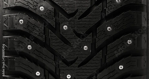 Studded winter tire background, loop-ready