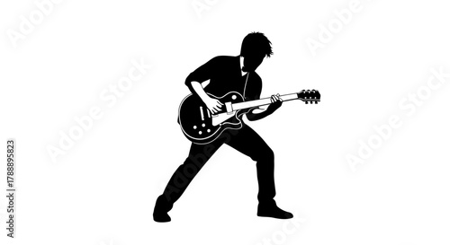 Silhouette of a man playing electric guitar, musician and rock music concept