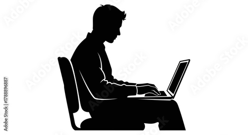 Silhouette of a man sitting and typing on a laptop computer