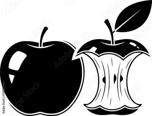 A whole apple sits near a bitten apple core with a leaf
