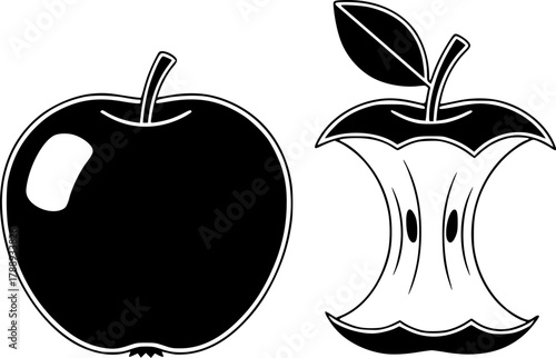 A whole apple sits near a bitten apple core with a leaf
