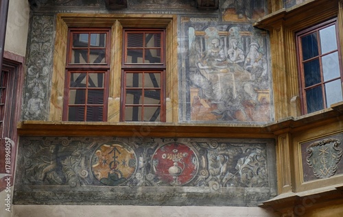Ornate biblical frescoes decorating Maison Pfister's exterior, highlighting Strasbourg's architectural storytelling and cultural depth