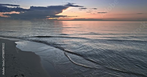 Calm golden sunset over Batlic sea in Poland.