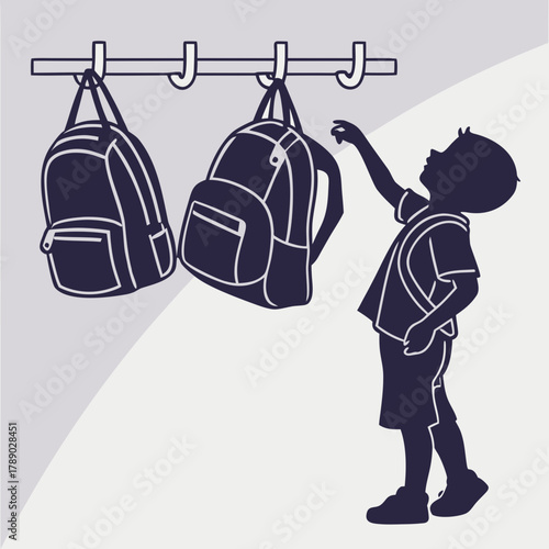 Boy reaching for backpack hanging on hooks in a hallway silhouette Keywords: boy, child, student