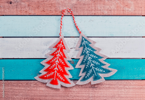 shape of pine tree christmas decoration on green  wooden background