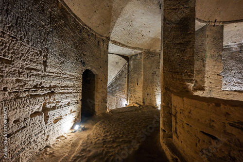 Bild auf Leinwand Inside the subterranean interior of the Kom El Shoqafa ancient Roman Catacombs, one of the Seven Wonders of the Medieval World, in Alexandria, Egypt
