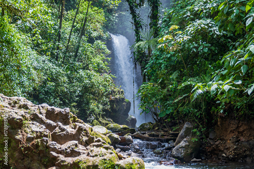 Landscape view of La Paz Waterfall (Catarata de La Paz) in a lush forest (Alajuela, Costa Rica). 