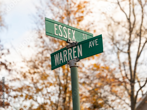 Green Metal street sign Essex and Warren